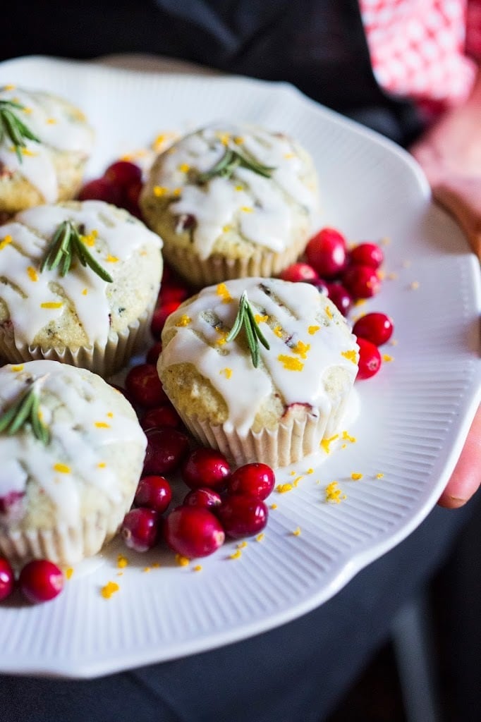 Festive Cranberry Orange Muffins - vegan and gluten-free, these are simple to make and full of flavor! A tasty. addition to your holiday table! #cranberrymuffins #veganmuffins #orangemuffins #glutenfreemuffins #holidaybaking 