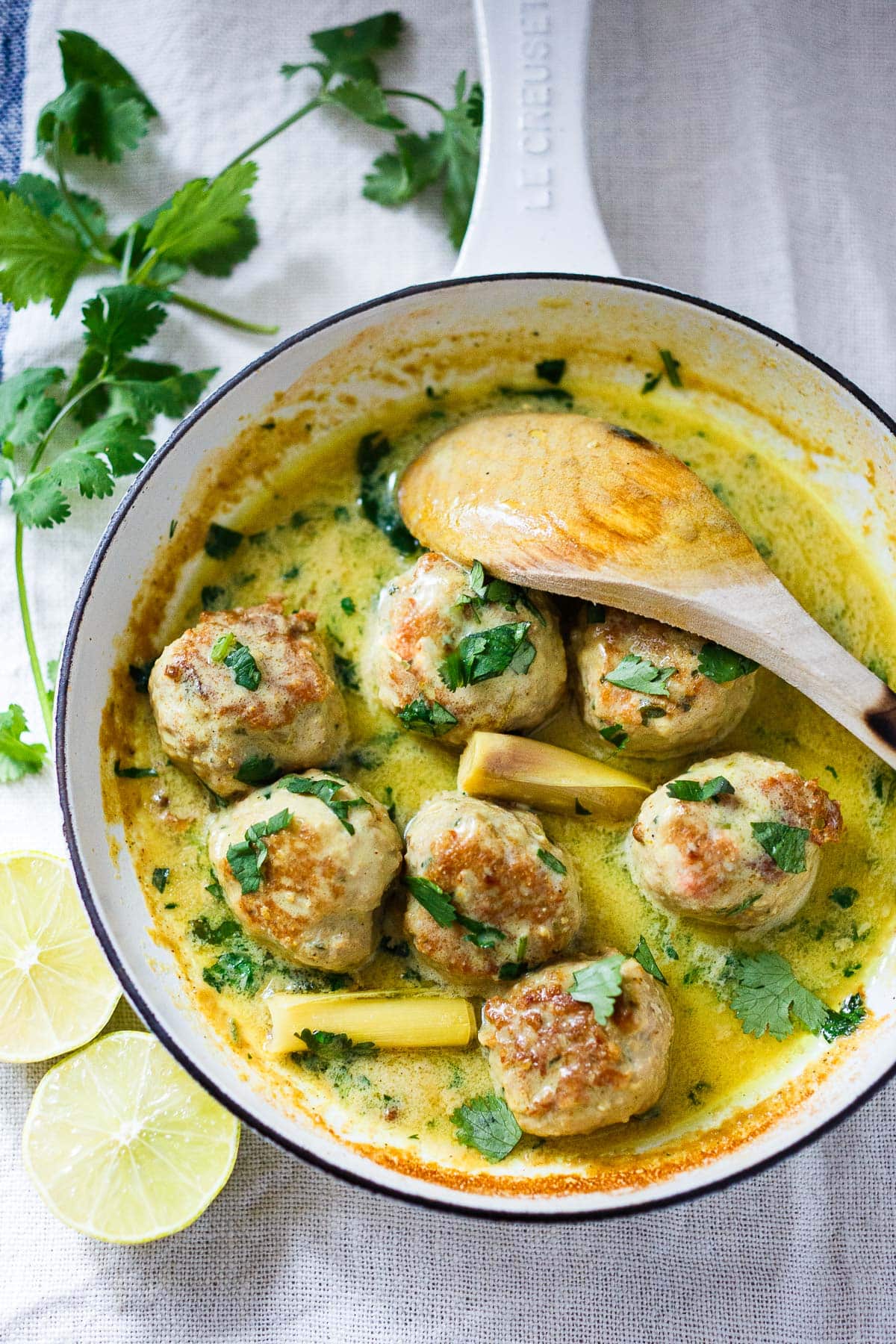 These Thai turkey meatballs are simmered in a fragrant coconut milk sauce with warm Thai spices and fresh lime. An easy, flavorful dinner with Thai-inspired flavors. Video. Low carb, keto-adaptable.