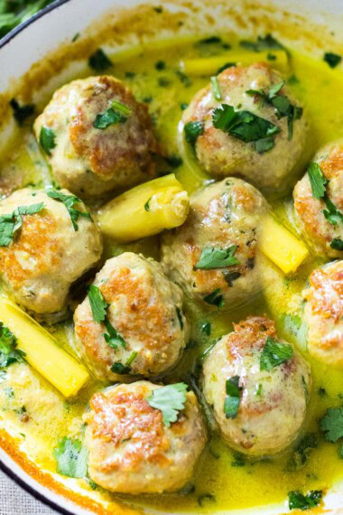 These Thai turkey meatballs are simmered in a fragrant coconut milk sauce with warm Thai spices and fresh lime. An easy, flavorful dinner with Thai-inspired flavors. Video. Low carb, keto-adaptable.