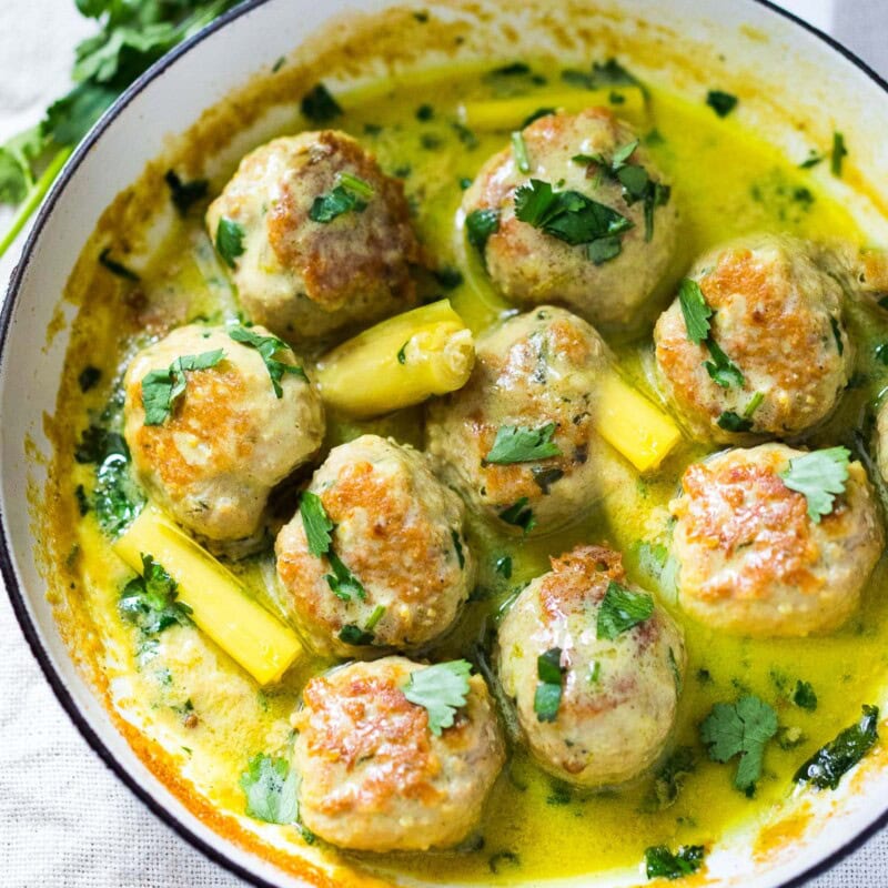 These Thai turkey meatballs are simmered in a fragrant coconut milk sauce with warm Thai spices and fresh lime. An easy, flavorful dinner with Thai-inspired flavors. Video. Low carb, keto-adaptable.