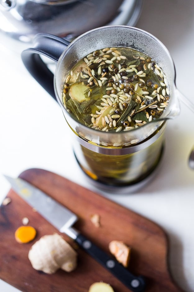 Turmeric Tea Ayurvedic Detox Tea- a "daily" drink made with fresh turmeric, ginger and whole spices to help aid the liver, flush out toxins and restore balance in the body. Healing and restorative. #detoxtea #turmerictea #ayurvedictea #tea #cleansingtea