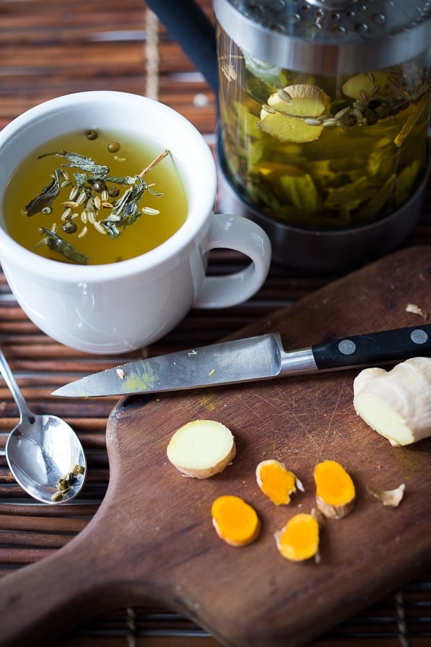 Ayurvedic Detox Tea- a daily drink with fresh turmeric, ginger and whole spices | www.feastingathome.com