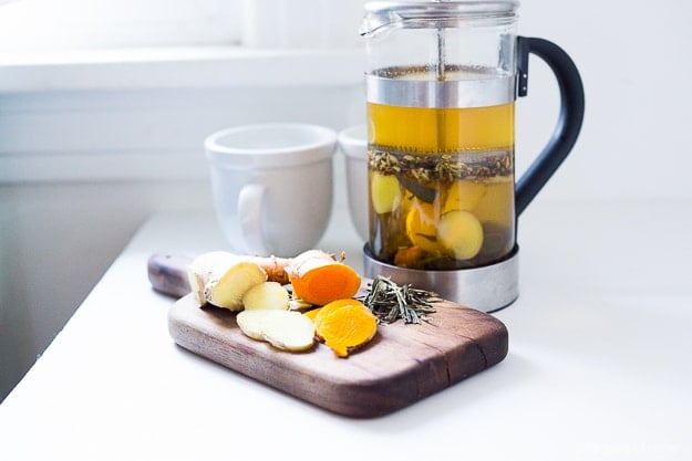 Ayurvedic Detox Tea- a daily drink with fresh turmeric, ginger and whole spices | www.feastingathome.com