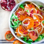 A bright and cheery Persimmon Salad with fennel, pomegranate, butter lettuce and citrus vinaigrette.