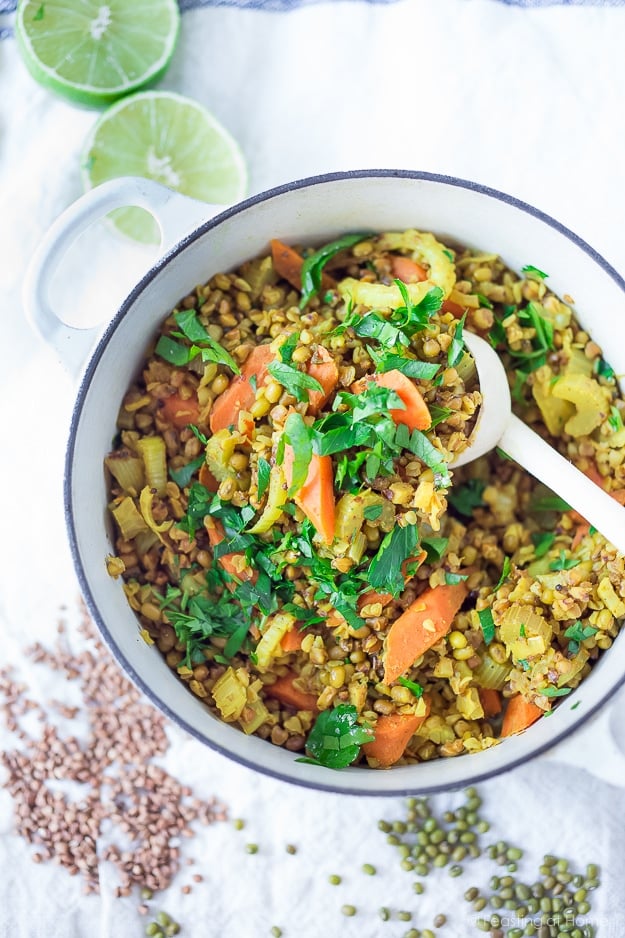 A healing bowl of khichdi, an Ayurvedic recipe considered to be India's "comfort food" made w/ healing ingredients, detoxing veggies & soothing turmeric. Vegan and GF | www.feastingathome.com #khichuri #khichdi #khichidi #ayurvedic #ayervedicrecipes #khichadi #vegan #mungbeans #buckwheat