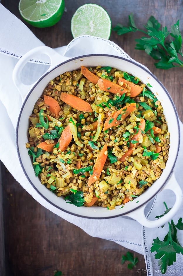 A healing bowl of khichdi, an Ayurvedic recipe considered to be India's "comfort food" made w/ healing ingredients, detoxing veggies & soothing turmeric. Vegan and GF | www.feastingathome.com #khichuri #khichdi #khichidi #ayurvedic #ayervedicrecipes #khichadi #vegan #mungbeans #buckwheat