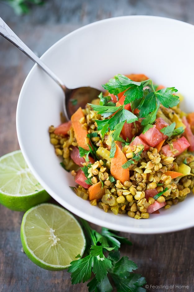 A healing bowl of khichdi, an Ayurvedic recipe considered to be India's "comfort food" made w/ healing ingredients, detoxing veggies & soothing turmeric. Vegan and GF | www.feastingathome.com #khichuri #khichdi #khichidi #ayurvedic #ayervedicrecipes #khichadi #vegan #mungbeans #buckwheat