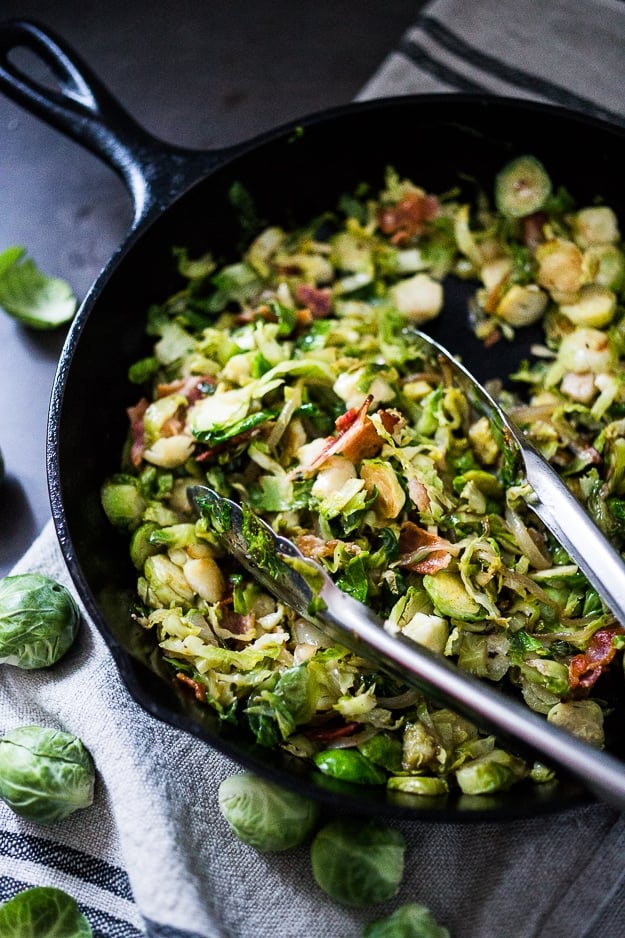 A delicious low-carb breakfast- Brussels sprouts and bacon hash in a skillet.