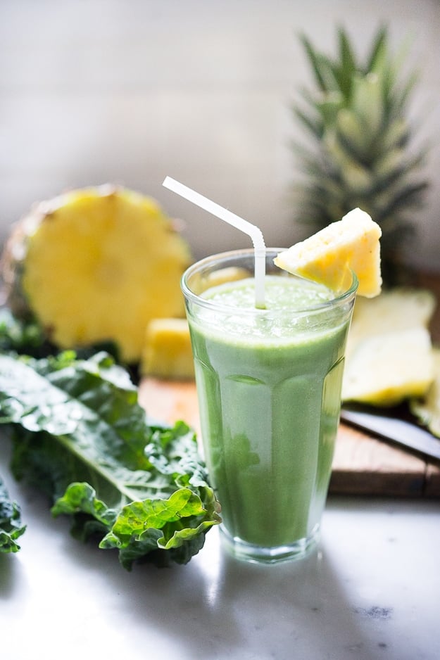 Matcha Green Tea & Pineapple Smoothie with Kale- an instant mood lifter and energizing drink full of healthy antioxidants! | www.feastingathome.com #matcha #smoothie #greensmoothie #matcharecipes #smoothies #vegan #plantbased #eatclean #detox #cleaneating