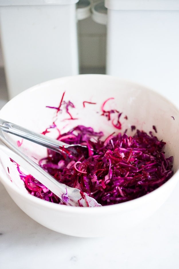 Beet and Cabbage Sauerkraut- an easy small batch recipe that can be made in a mason jar. | www.feastingathome.com