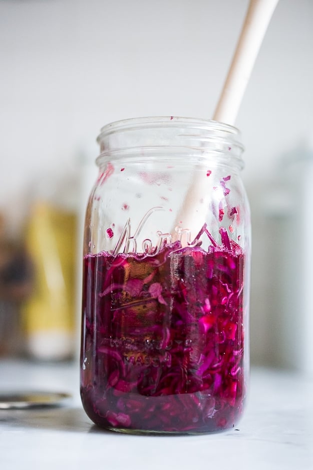 Beet and Cabbage Sauerkraut- an easy small batch recipe that can be made in a mason jar. | www.feastingathome.com