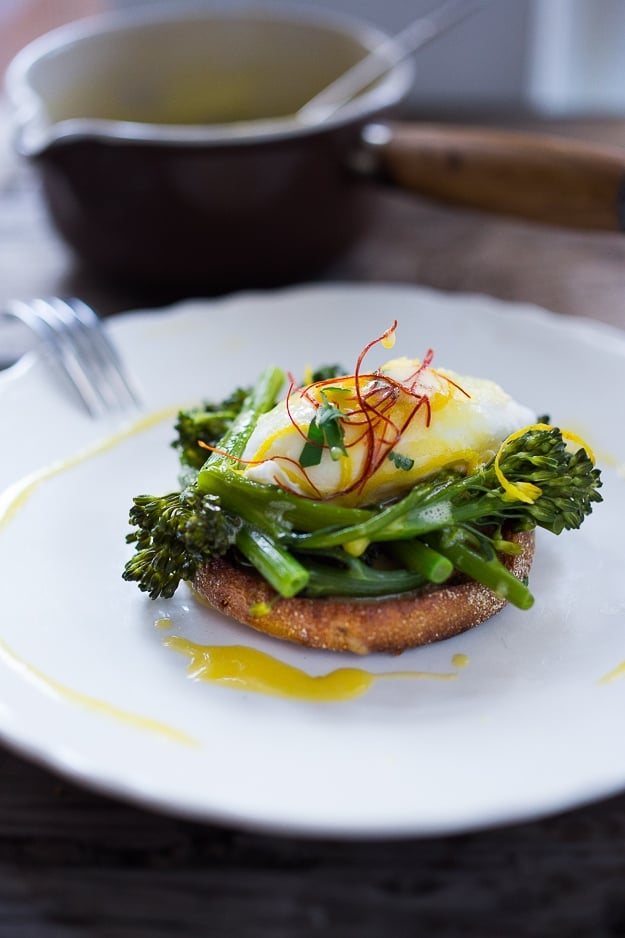 This delicious Vegetarian Eggs Benedict recipe is made with broccolini and a tangy, luscious Meyer Lemon Hollandaise sauce. Dreamy and delicious! Vegan-adaptable!