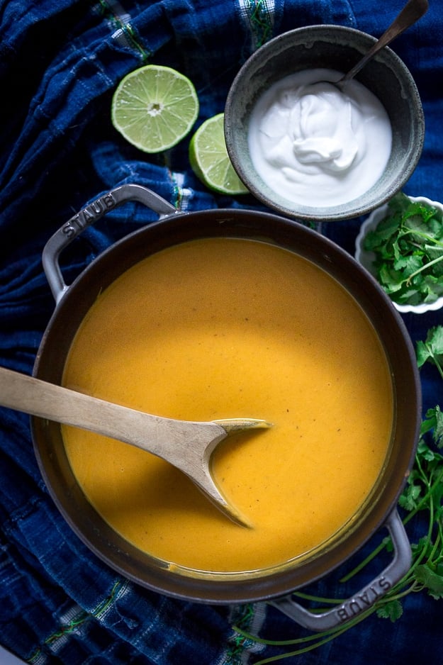 Thai Sweet Potato Soup with coconut, lemongrass and ginger....a light and healthy recipe that is Vegan and Gluten free! | www.feastingathome.com #sweetpotatosoup #thaisoup #sweetpotatorecipe 