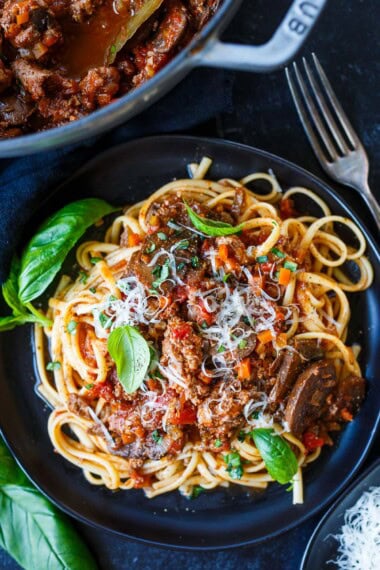 This lightened-up Turkey Bolognese recipe (aka Sunday Sauce) is made with ground turkey and mushrooms. It's hearty, robust, and full of deep umami flavor! Make it in a slow cooker, on the stovetop, or in an Instant Pot.