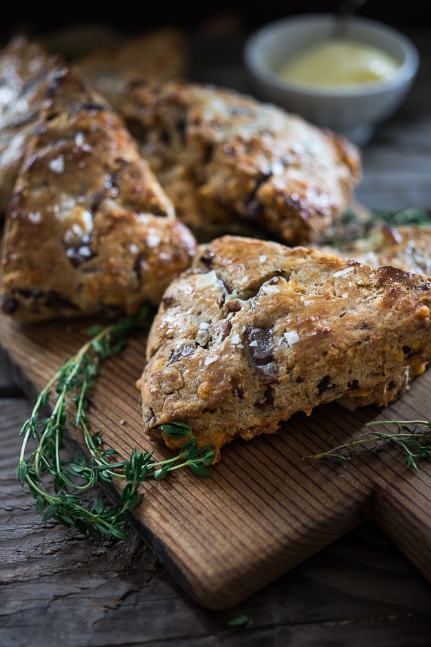 Cheddar Scones with caramelized onions, made with optional Rye flour. Very easy and delicious, the perfect savory scone to serve with soups and stews! #scones #savory #easy #cheddarscones 