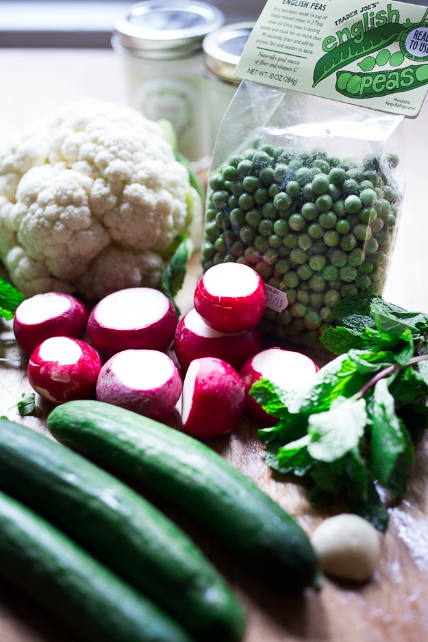 Shaved Cauliflower and Spring Pea Salad w/ Yogurt and Mint | www.feastingathome.com