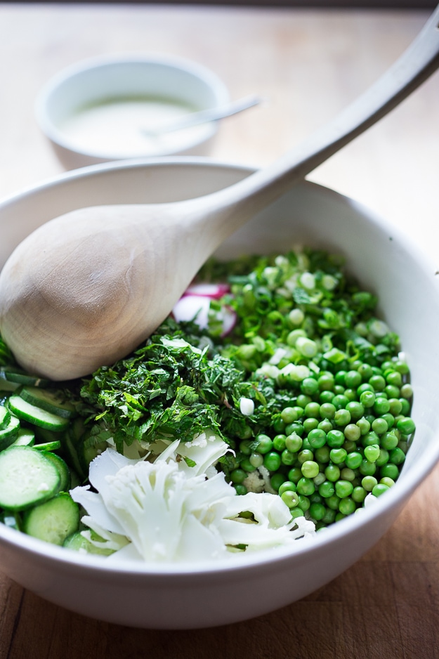 Shaved Cauliflower and Spring Pea Salad w/ Yogurt and Mint | www.feastingathome.com