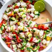ceviche recipe with lime halve in a bowl.