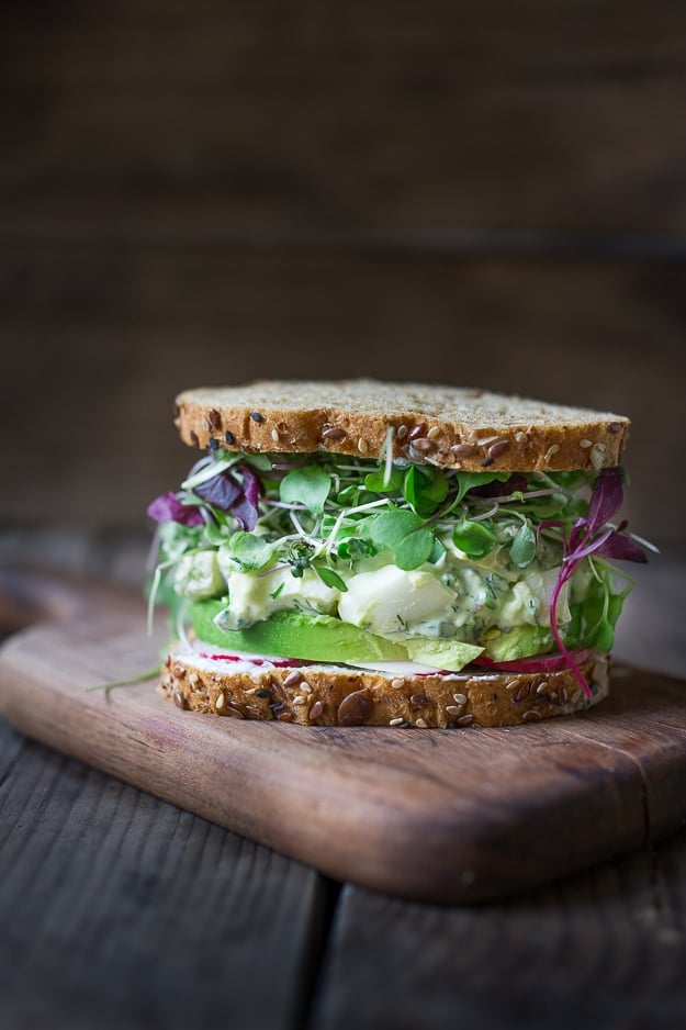 Green Goddess Egg Salad with Avocado- make this into a sandwich, a wrap or serve over a bed of greens for hearty low carb meal. Also tasty on bruschetta, served as and appetizer. #eggsalad #eggsaladsandwich | www.feastingathome.com #keto #lowcarb #healthylunch 