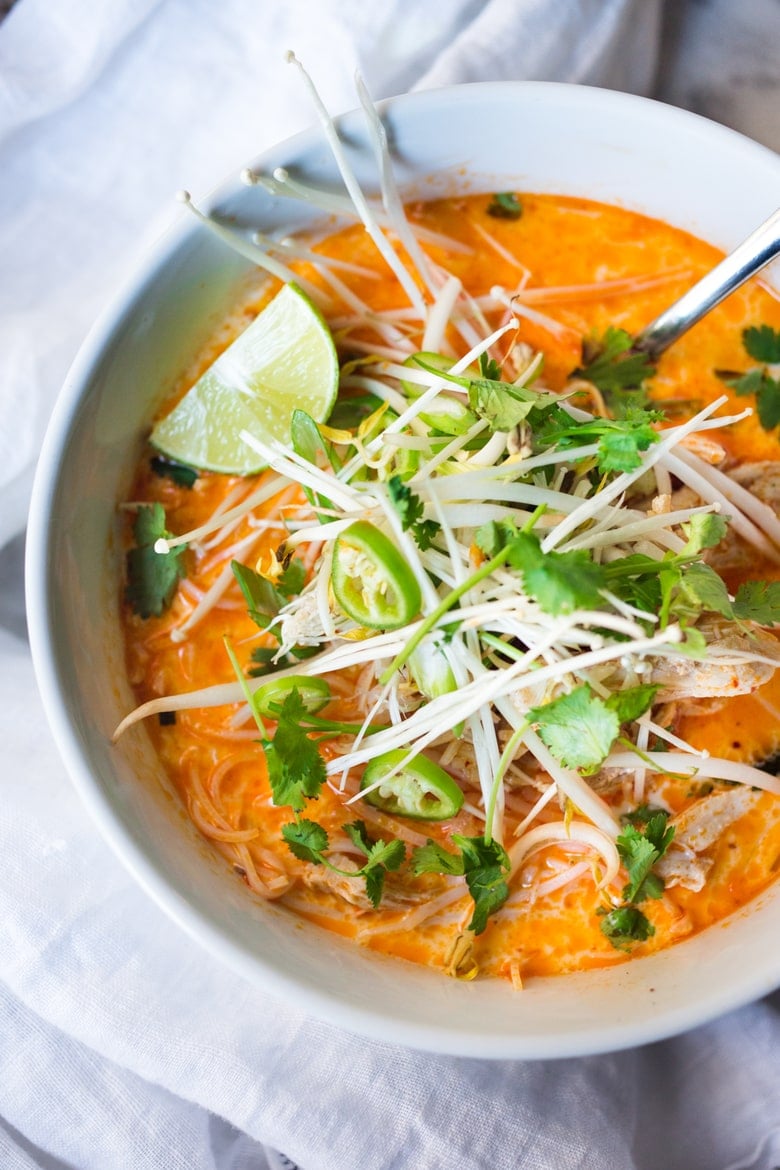 Laksa Soup w/ Malaysian style coconut curry broth, chicken or shrimp over rice noodles with fresh bean spouts, lime and cilantro. | www.feastingathome.com