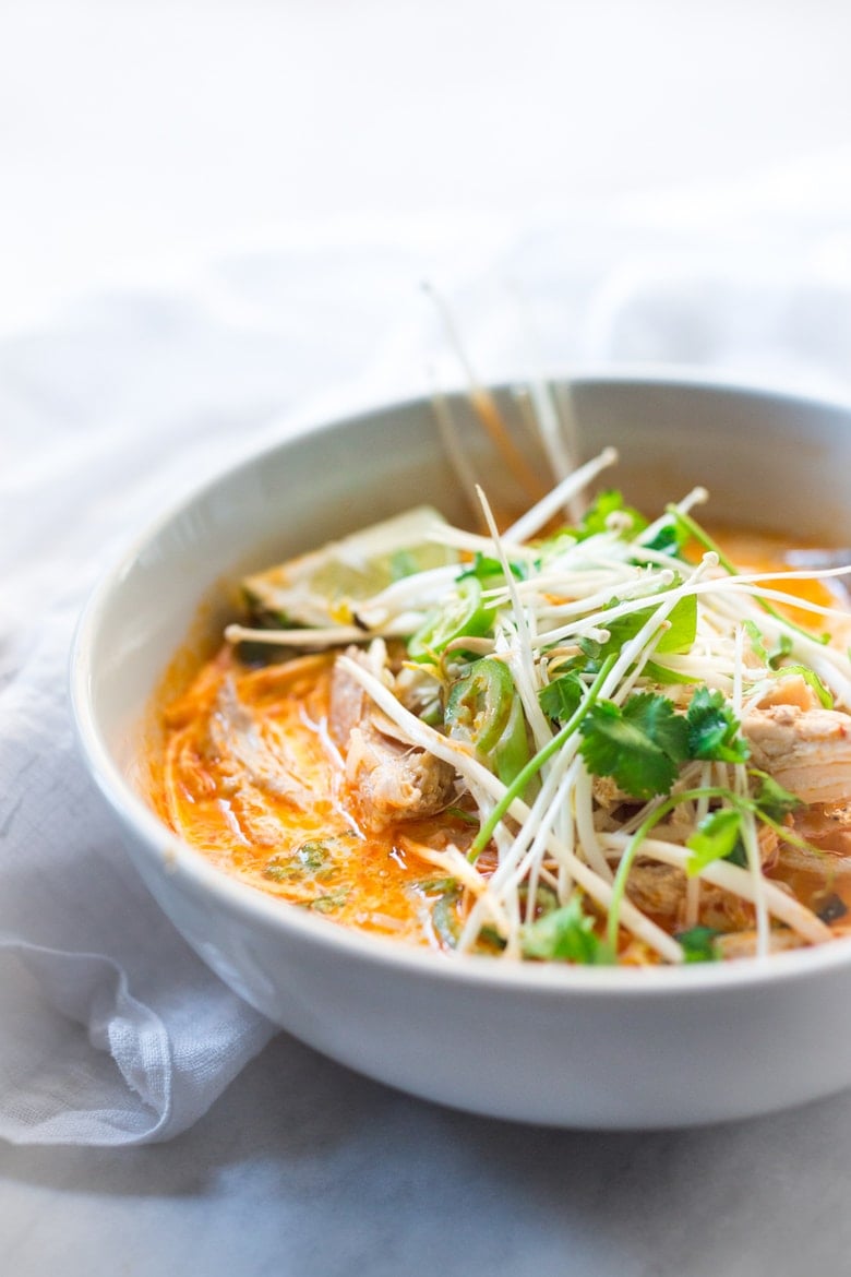 Laksa Soup w/ Malaysian style coconut curry broth, chicken or shrimp over rice noodles with fresh bean spouts, lime and cilantro. | www.feastingathome.com