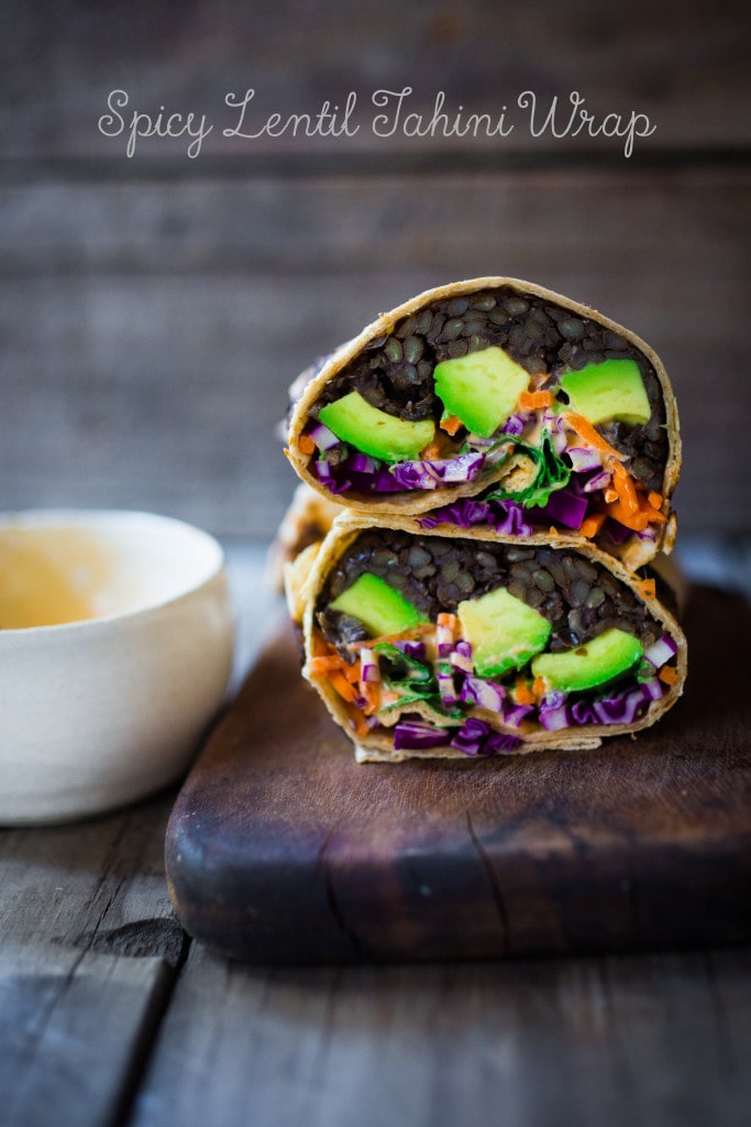 Spicy Lentil Tahini Wrap with avocado, carrots, cabbage and the tastiest Sriracha Tahini Sauce. Vegan and Delicious! #lentilwrap