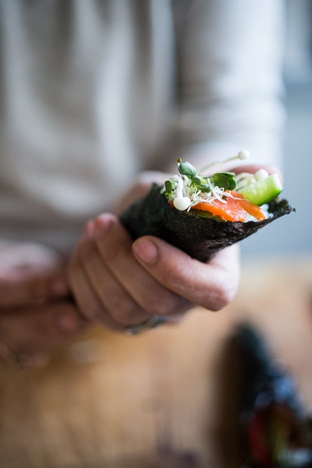 How to make Sushi Hand Rolls (aka Temaki) with smoked salmon, avocado, cucumber, shiitakes and daikon sprouts! An easy step-by-step guide to making Japanese sushi rolls!