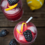 The bramble cocktail is a refreshing summer drink that combines fresh muddled blackberries, gin, lemon juice and sparkling water.