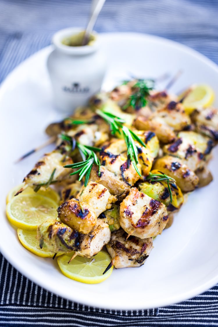 Grilled Dijon Chicken Skewers with leeks, potatoes and Rosemary. A delicious, healthy meal perfect for summer nights on the patio! #skewers #chickenskewers #dijonchicken #grilledchicken 