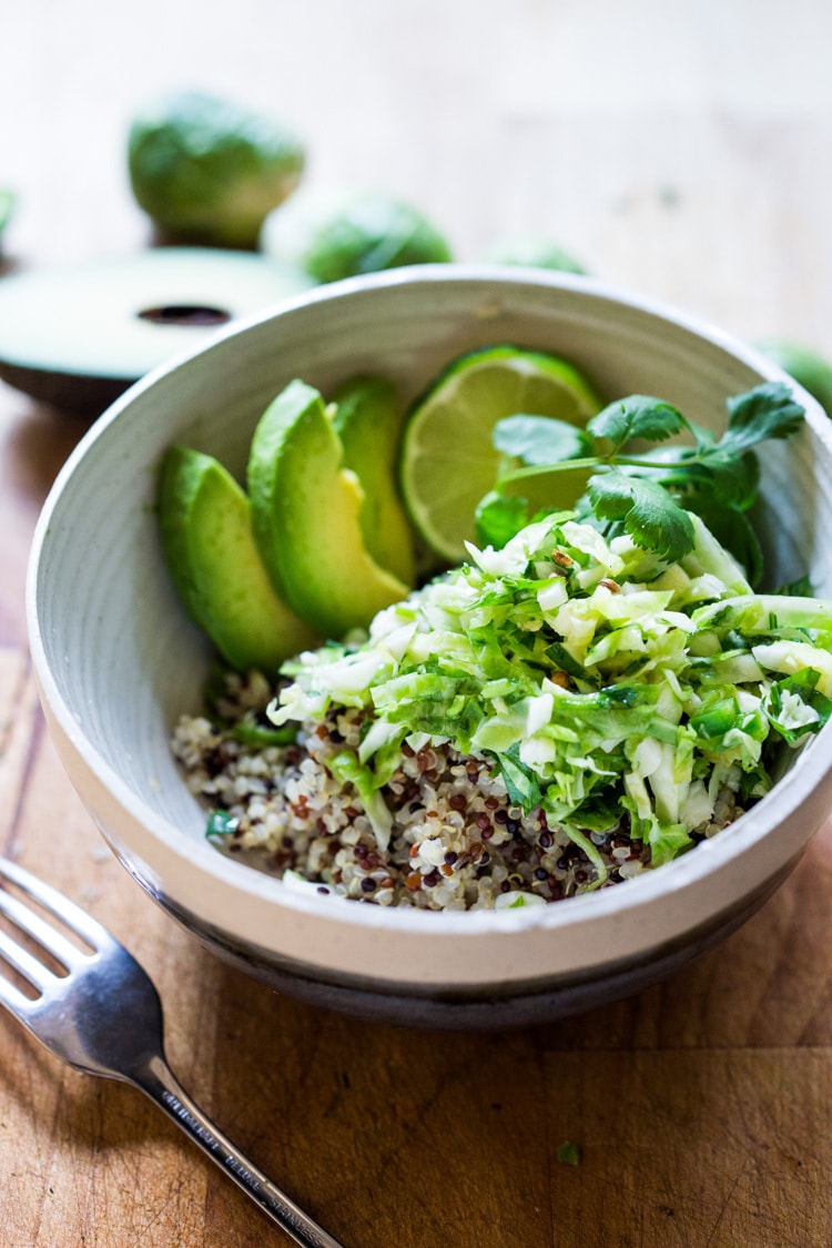 Vegan Mexican Brussel Sprout Salad with jalapeño, lime and cilantro! Serve as a "taco slaw",  a side salad for grill mains or meats. This salad can be made ahead! #brusselsproutsalad #brusslesproutslaw #brusselsprouts #veganslaw #vegansalad #mexicanslaw