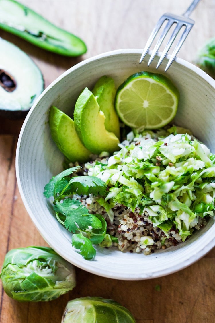 Vegan Mexican Brussel Sprout Salad with jalapeño, lime and cilantro! Serve as a "taco slaw",  a side salad for grill mains or meats. This salad can be made ahead! #brusselsproutsalad #brusslesproutslaw #brusselsprouts #veganslaw #vegansalad #mexicanslaw