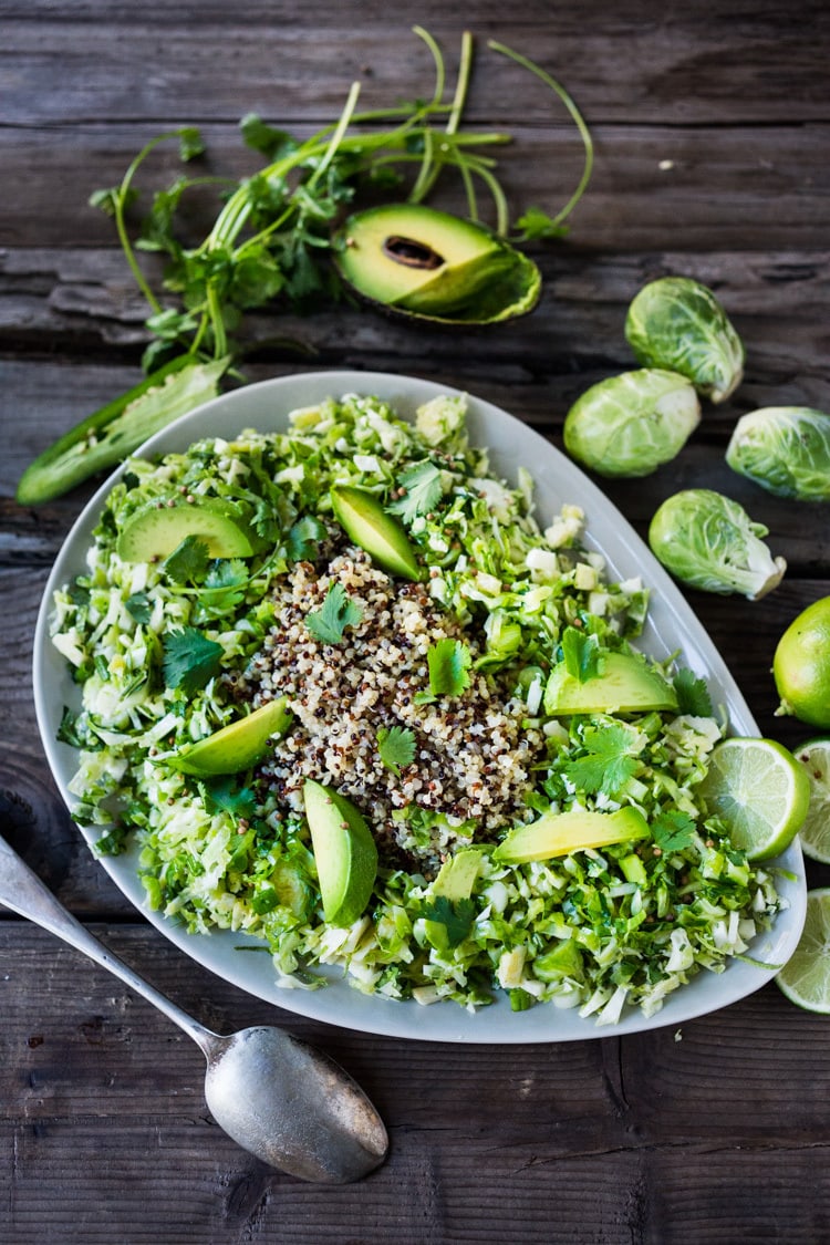 Vegan Mexican Brussel Sprout Salad with jalapeño, lime and cilantro! Serve as a "taco slaw",  a side salad for grill mains or meats. This salad can be made ahead! #brusselsproutsalad #brusslesproutslaw #brusselsprouts #veganslaw #vegansalad #mexicanslaw