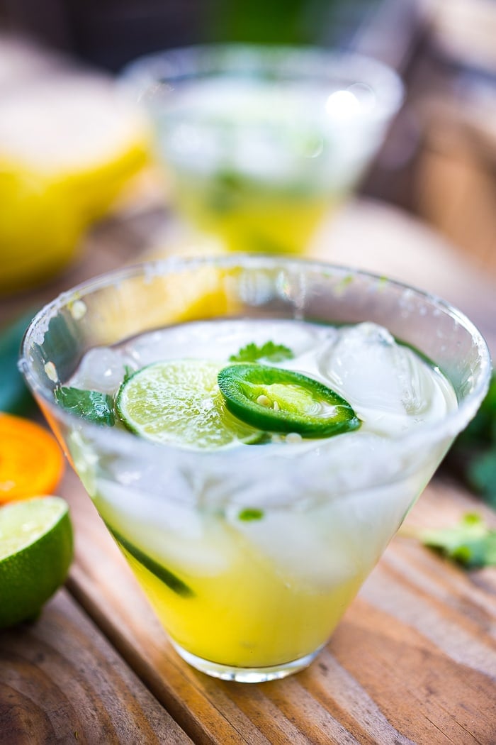 A delicious "healthier" recipe for Mezcal Margaritas- with fresh limes, jalapeno, and cilantro...smoky, spicy and oh so refreshing! Designed for the "grown up" palate. If you like Scotch, you'll love this. #mezcal #margarita 
