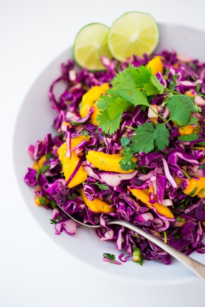 20 Delicious Cabbage Recipes: Cabbage Mango Slaw in a serving bowl. 