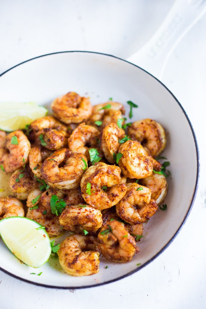 The BEST Shrimp Tacos with a Mango Cabbage Slaw- bursting with Caribbean flavors! Healthy, easy and fast- and can be made in 30 mins!| #shrimptacos #bestshrimptacos #shrimp #mango #cabbageslaw #tacos #mangosalad #blackbeantacos #prawntacos 