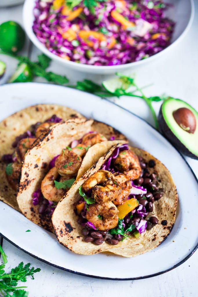 Caribbean Cabbage and Mango Slaw- this healthy, detoxing recipe is low in fat, vegan and gluten free. Makes a great side...or try this in my Caribbean Shrimp Tacos! | www.feastingathome.com