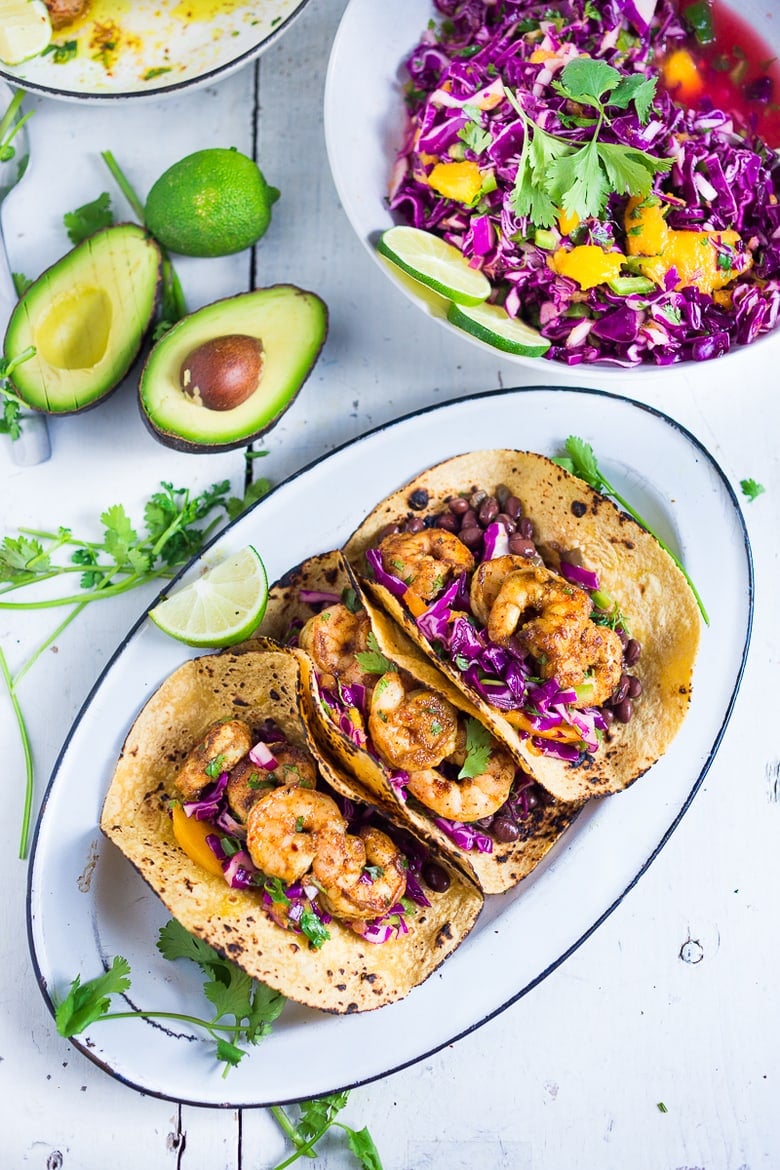 Caribbean Shrimp Tacos with Mango cabbage Slaw and Cuban Style Blackbeans...a healthy fast dinner perfect for summer!