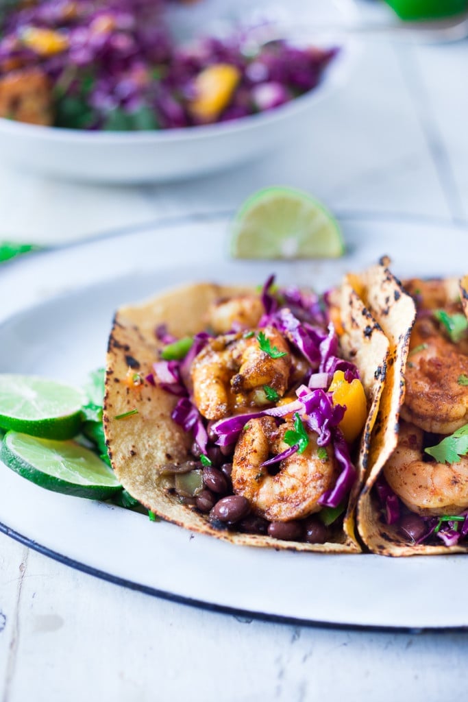 Caribbean Shrimp Tacos with Mango Cabbage Slaw- bursting with Caribbean flavor! Healthy and can be made in 30 mins!| www.feastingathome.com 