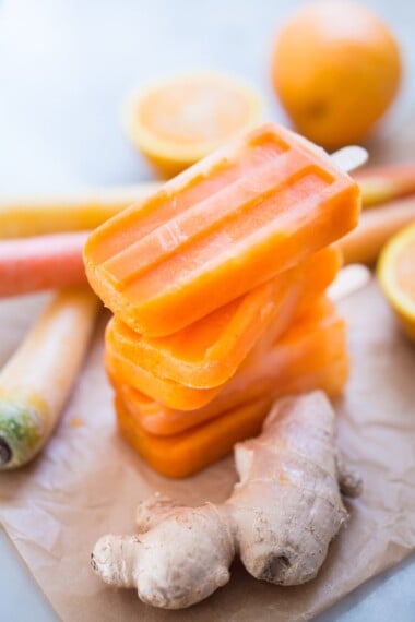 Healthy, delicious Grown-up Ice Pops with Orange, Carrot and Ginger and a hint of Turmeric, incredibly restorative and refreshing! | www.feastingathome.com
