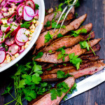 Grilled Flank Steak with Sweet Corn & Radish Salad...a healthy summer weeknight meal that can be made in 30 minutes! | www.feastingathome.com #grilledsteak #grilledflank #flanksteak #corn #cornsalad