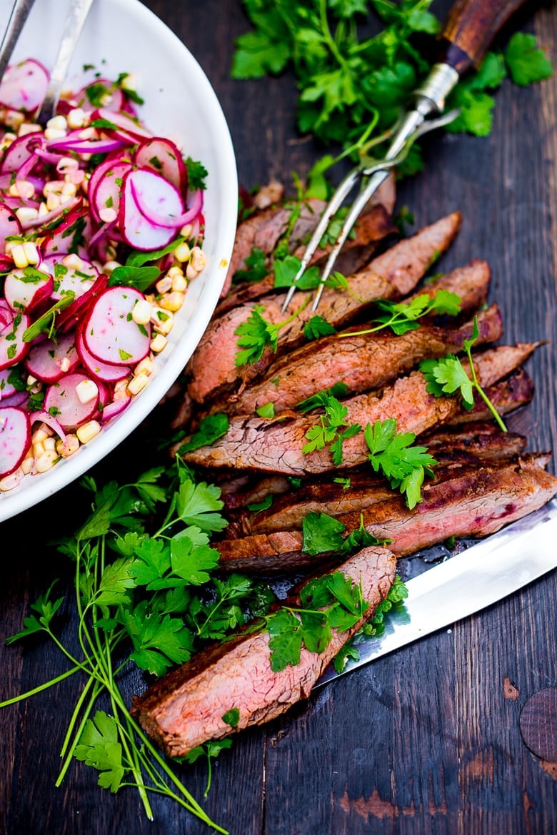 30 Summer Dinner Recipes | Grilled Flank Steak with Sweet Corn & Radish Salad...a healthy summer weeknight meal that can be made in 30 minutes! | www.feastingathome.com #grilledsteak #grilledflank #flanksteak #corn #cornsalad