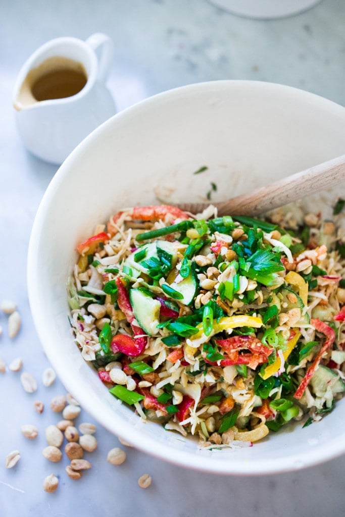 Thai Vegetable Crunch Salad with mint, thai basil and scallions and a light peanut ginger dressing- vegan and gluten free| www.feastingathome.com