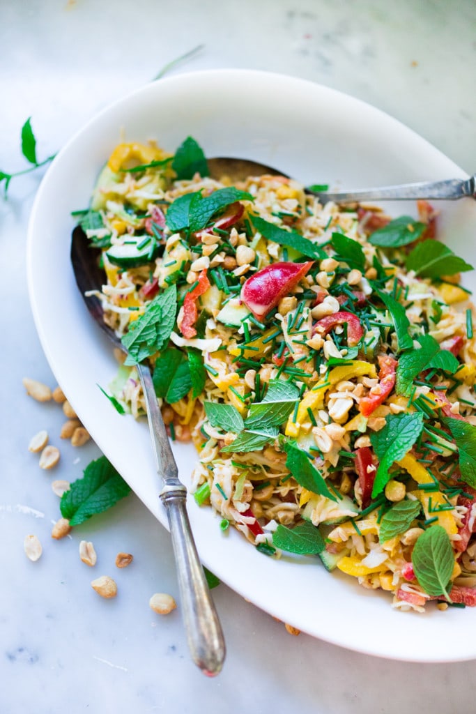 Thai Crunch Salad with mint, thai basil and scallions and a light peanut ginger dressing- vegan and gluten free| www.feastingathome.com