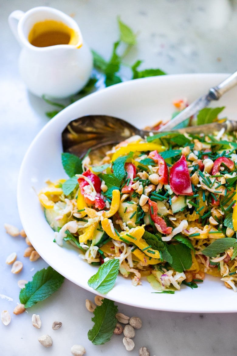 Thai Crunch Salad with a light peanut ginger dressing- vegan and gluten free| www.feastingathome.com