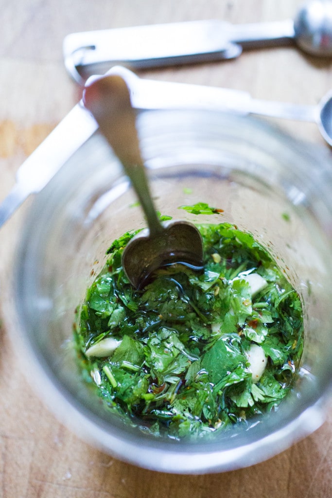 Marinated Fava beans- with olive oil, vinegar, garlic, lemon zest and fresh herbs- a great way to persevere summer shelling beans. Serve with hummus and pita!| www.feastingathome.com 