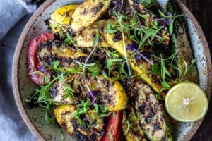 A simple recipe for Grilled Zucchini with zaatar, garlic and lemon. Serve it with tzatziki for extra richness. Full of flavor, delicious and healthy!