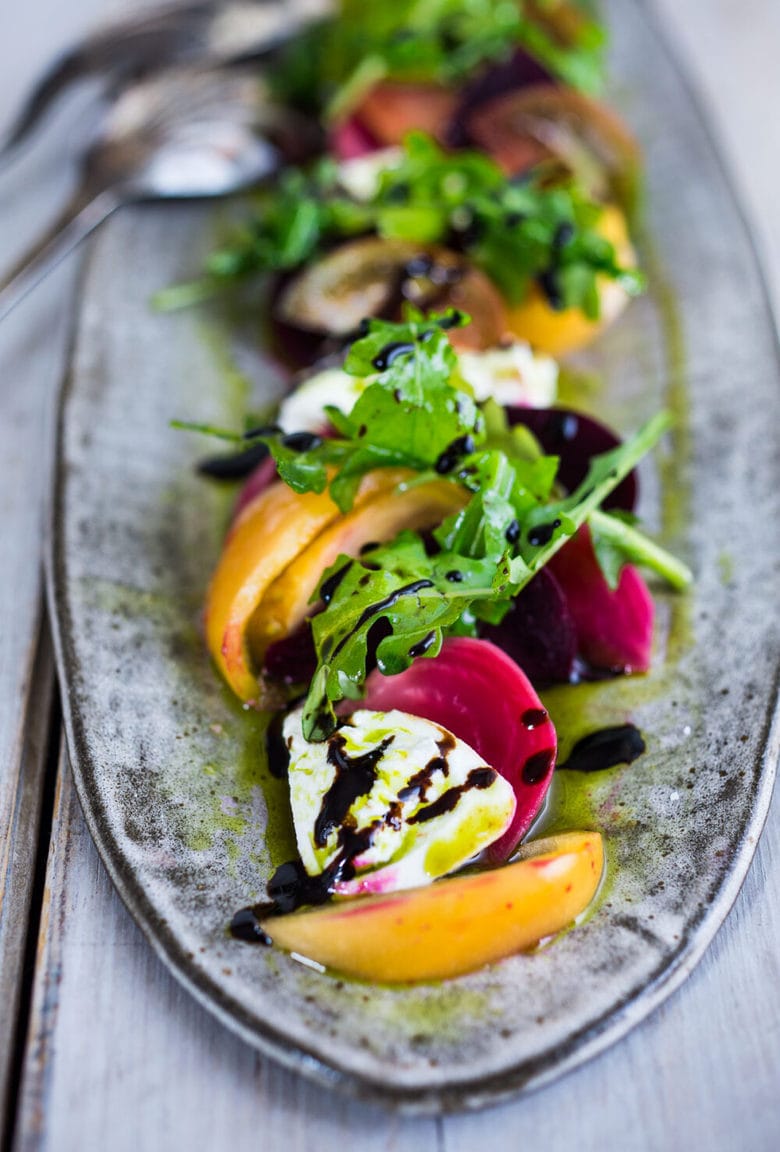 This Heirloom Tomato, Beet and Burrata Salad with flavorful Basil Oil is not only beautiful, but it is also delicious! Perfect for special gatherings... elegant, healthy and oh soooooooo tasty! 