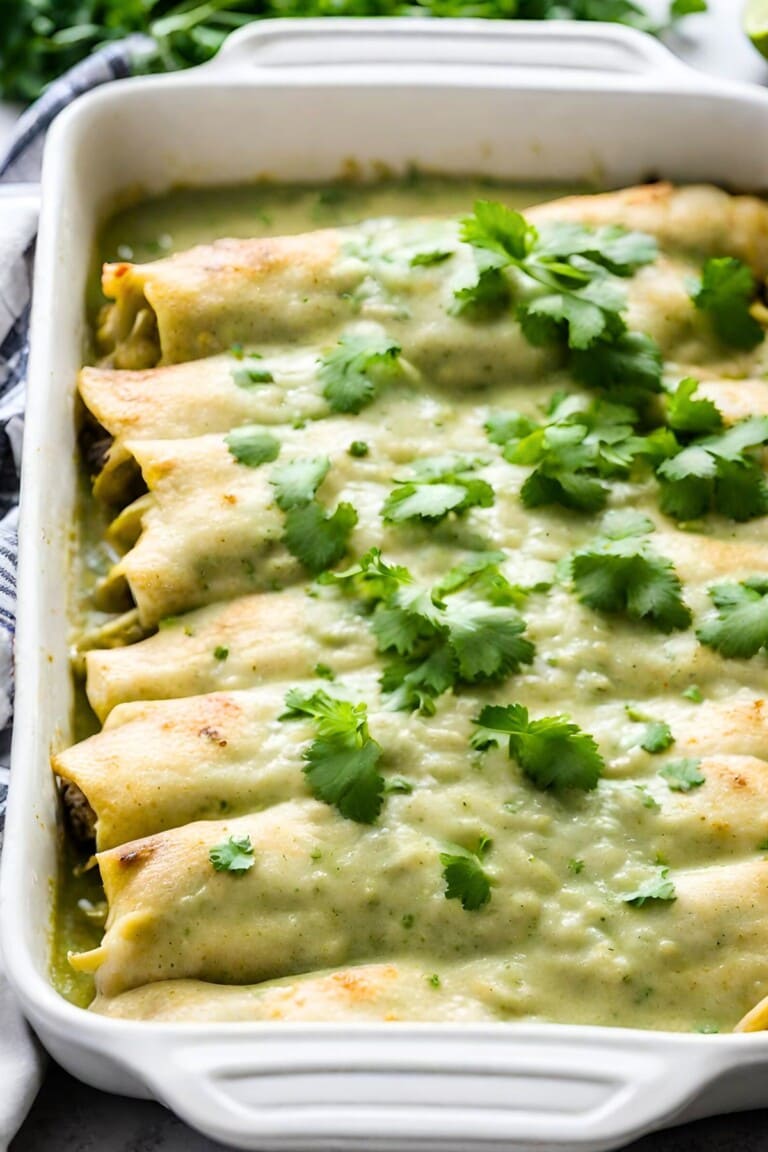 A delicious recipe for Green Enchiladas slathered in Green Enchilada Sauce. Make it with chicken or keep it vegetarian!