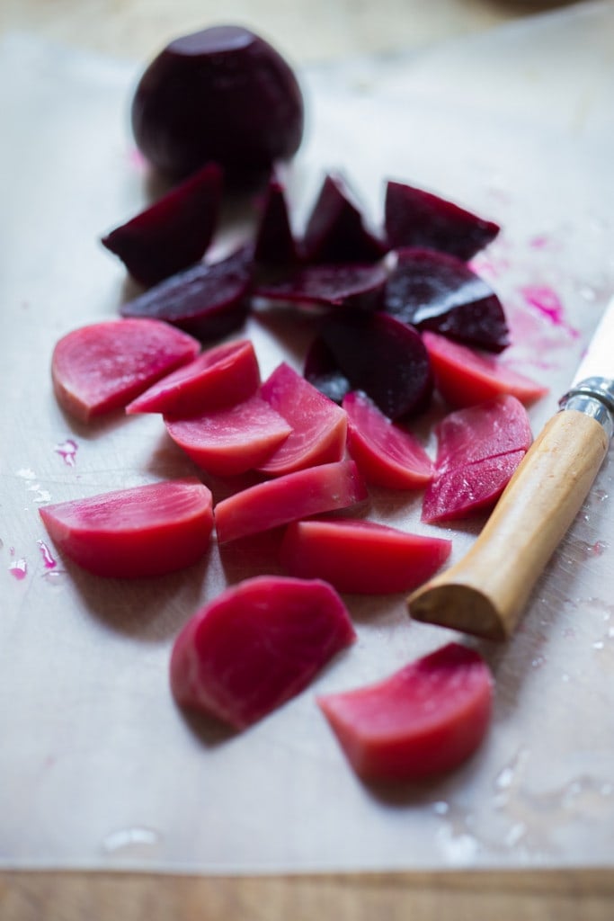 blanched beets are being cut for burrata salad.