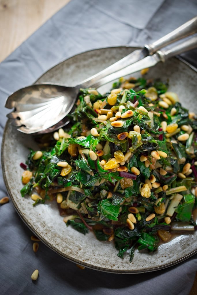 Catalan-Style, Sauteed Spinach with garlic, golden raisins, and pine nuts, a simple, flavorful side dish that can be made in 25 minutes. 